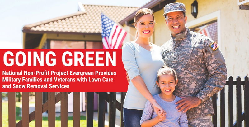 Military family standing in front of a home