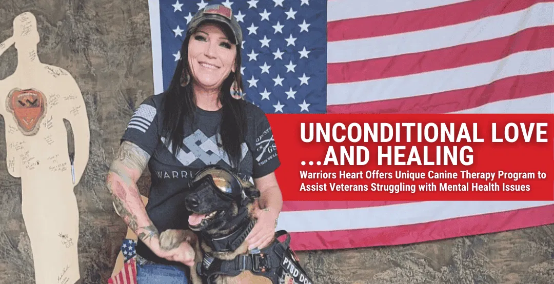 A woman standing next to a service dog