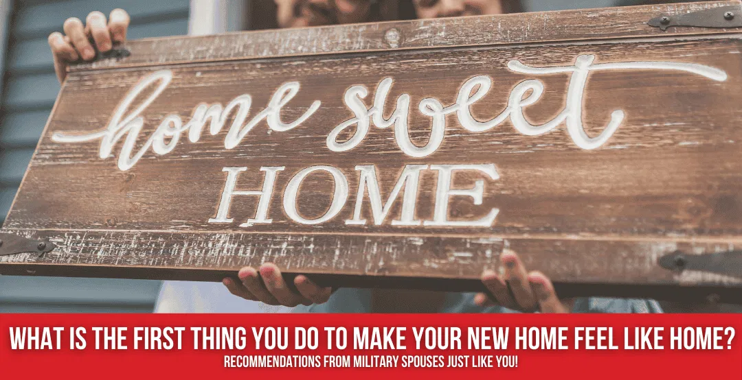 Couple holding a wooden sign reading, "Home Sweet Home"