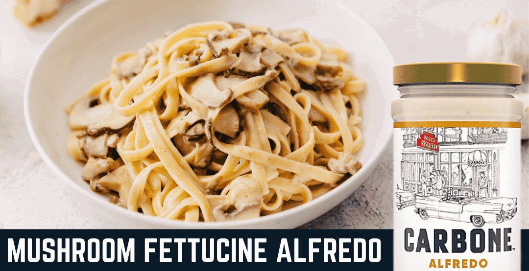 A fresh bowl of Carbone's mushroom fettuccine alfredo on a table